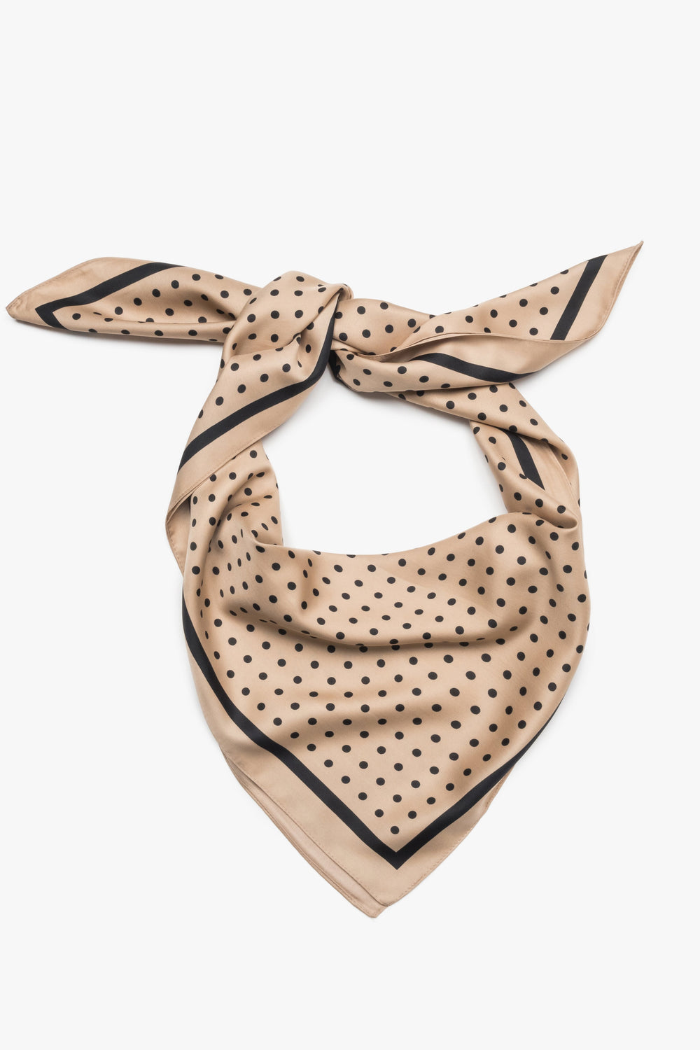 Frontansicht des gefalteten beige-schwarzen Damen-Halstuchs mit klassischem Punktemuster
