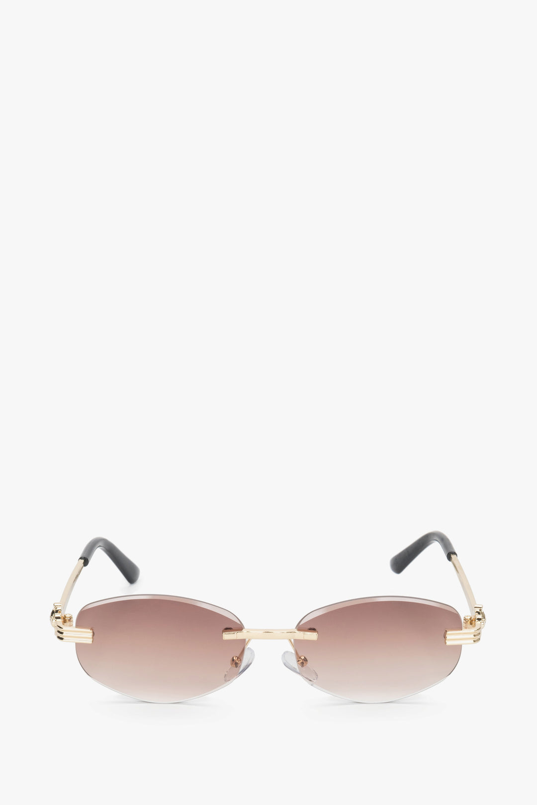 Frontansicht der braun-goldfarbenen ovalen rahmenlosen Damen-Sonnenbrille.