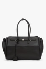 Frontalansicht der formstabilen dunkelbraunen Damen-Koffertasche aus Echtleder.