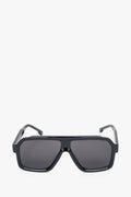 Frontansicht der großen schwarzen Damen-Sonnenbrille in geometrischer Form.