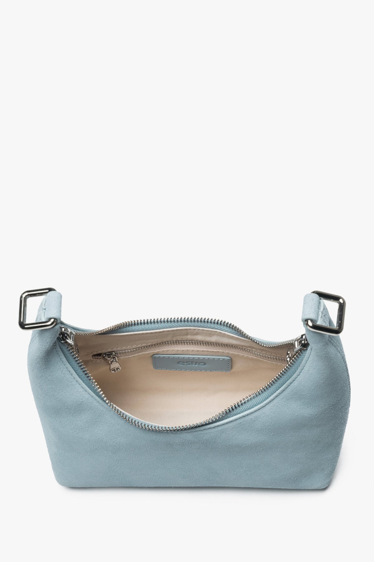 Innenansicht der hellblauen Tasche mit Reißverschluss und Taschen.