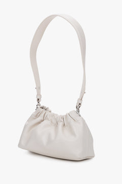 Kleine milchbeige Damen-Tasche aus Echtleder mit kurzem Schulterriemen