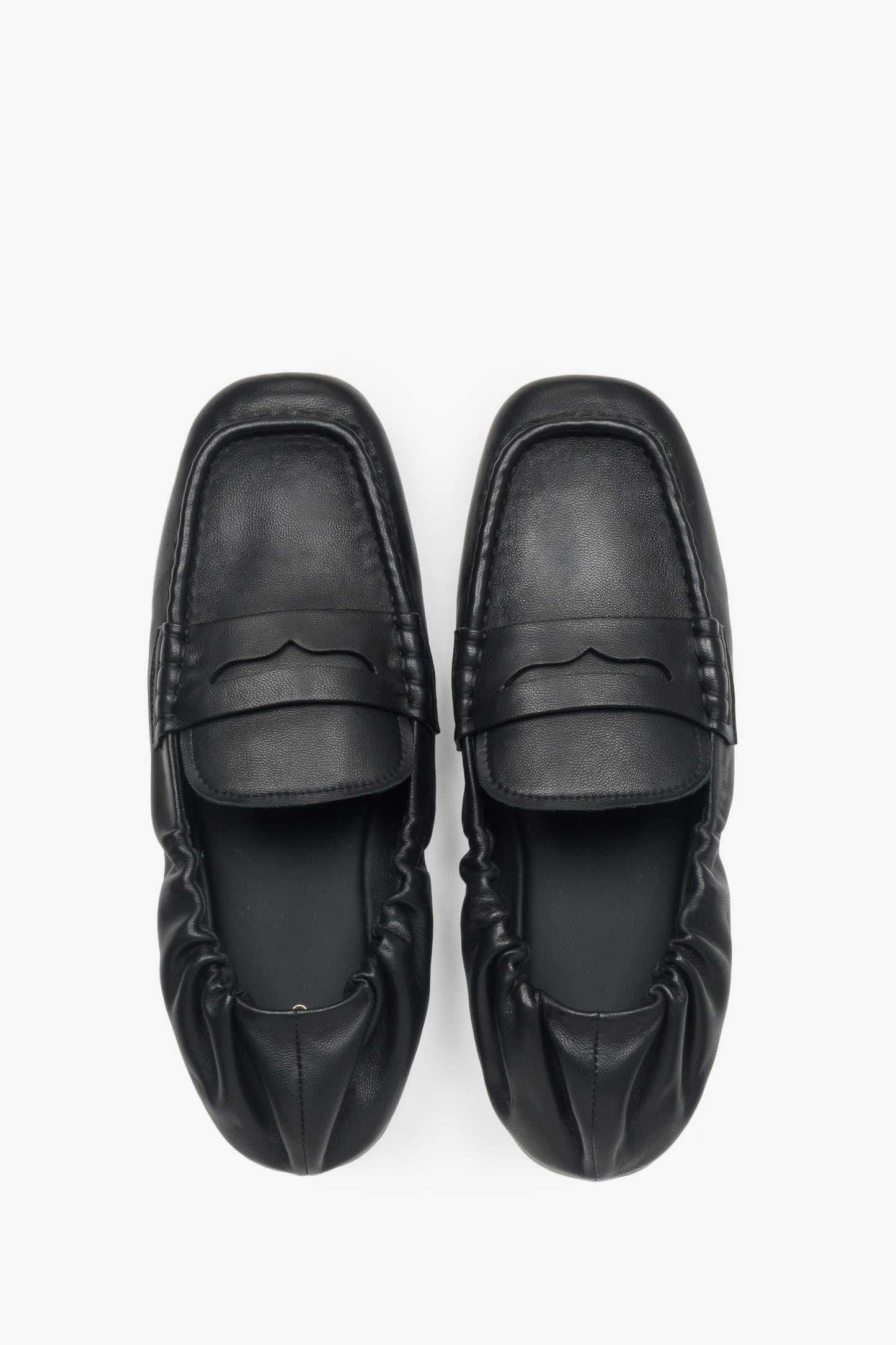Bequeme Damen-Slipper in Schwarz, ideal für den Business-Look.