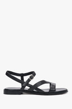 Schwarze flache Damen-Sandalen aus echtem Leder in seitlicher Profilansicht