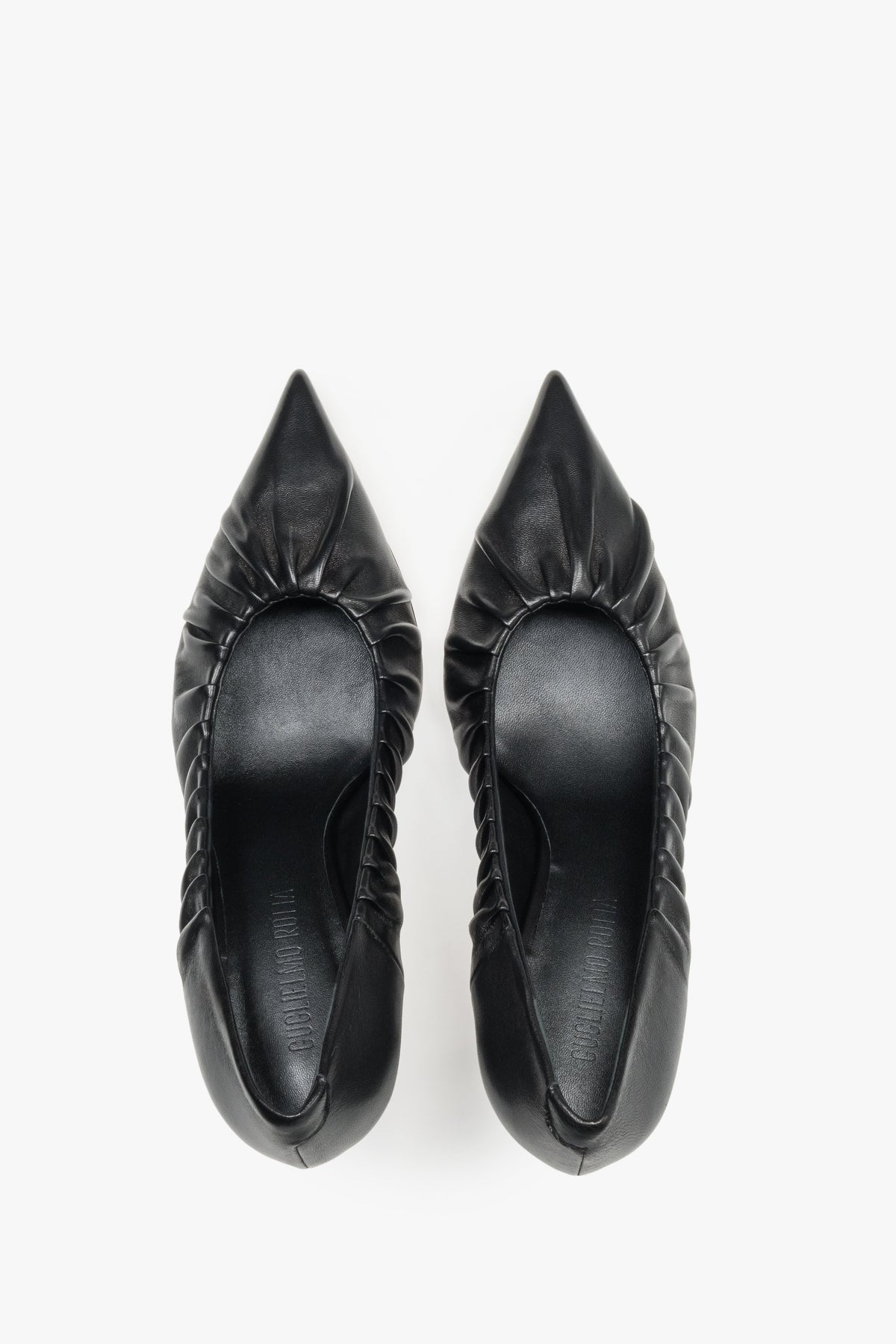Paar schwarze High Heels von Guglielmo Rotta von oben